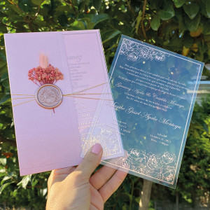 Rose gold printed acrylic birthday invitation. Pink pearl half envelope, Rose wax seal and pink flowers.