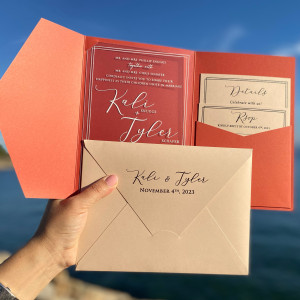 Acrylic Wedding Invitation. Burnt orange envelope with pocket. White print. Detail Card. Blush color mailing envelope