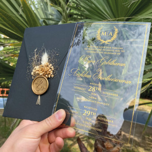 Acrylic wedding invitation, Wedding invitation, Clear acrylic invitation, Black envelope, Gold wax seal and dried flowers.