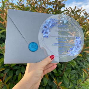 Acrylic Royal Sweet 16 invitation. Acrylic invitation card with blue flowers. Gray square envelope. Blue wax seal