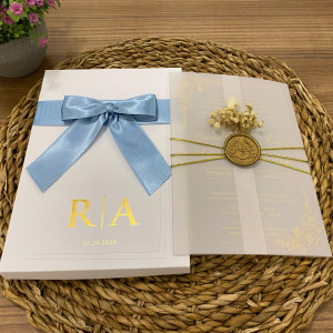 Boxed wedding invitation. Acrylic wedding invitation, Wedding invitation, Clear acrylic invitation, Ivory invitation box with blue ribbon