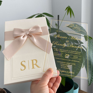 Wedding Invitation Box. Acrylic Wedding Invitation. Gold Foil Print. Parchment Shirt. Golden Wax Seal And Dried Flowers. Ivory Box With Gold Foil Print And Ribbon