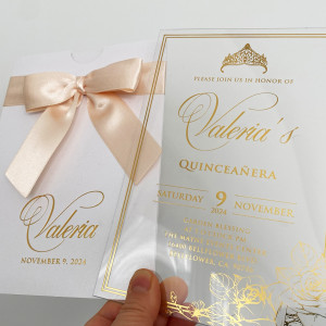 Acrylic Quinceañera invitation, Gold foil printed, White mother-of-pearl envelope with ribbon and gold foil print.